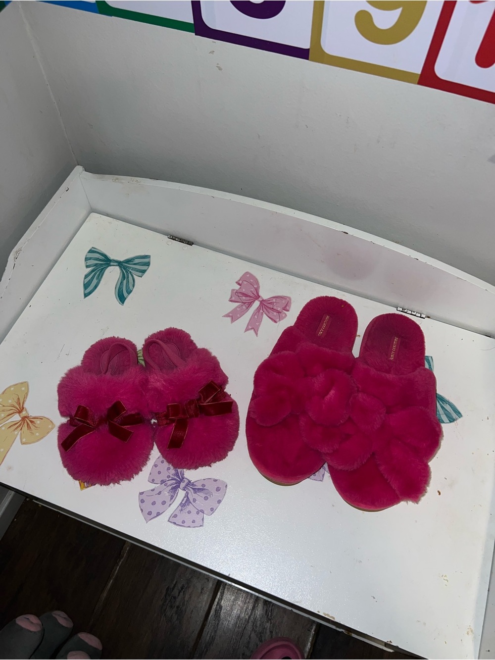 Matching soft pink slippers for mom and daughter